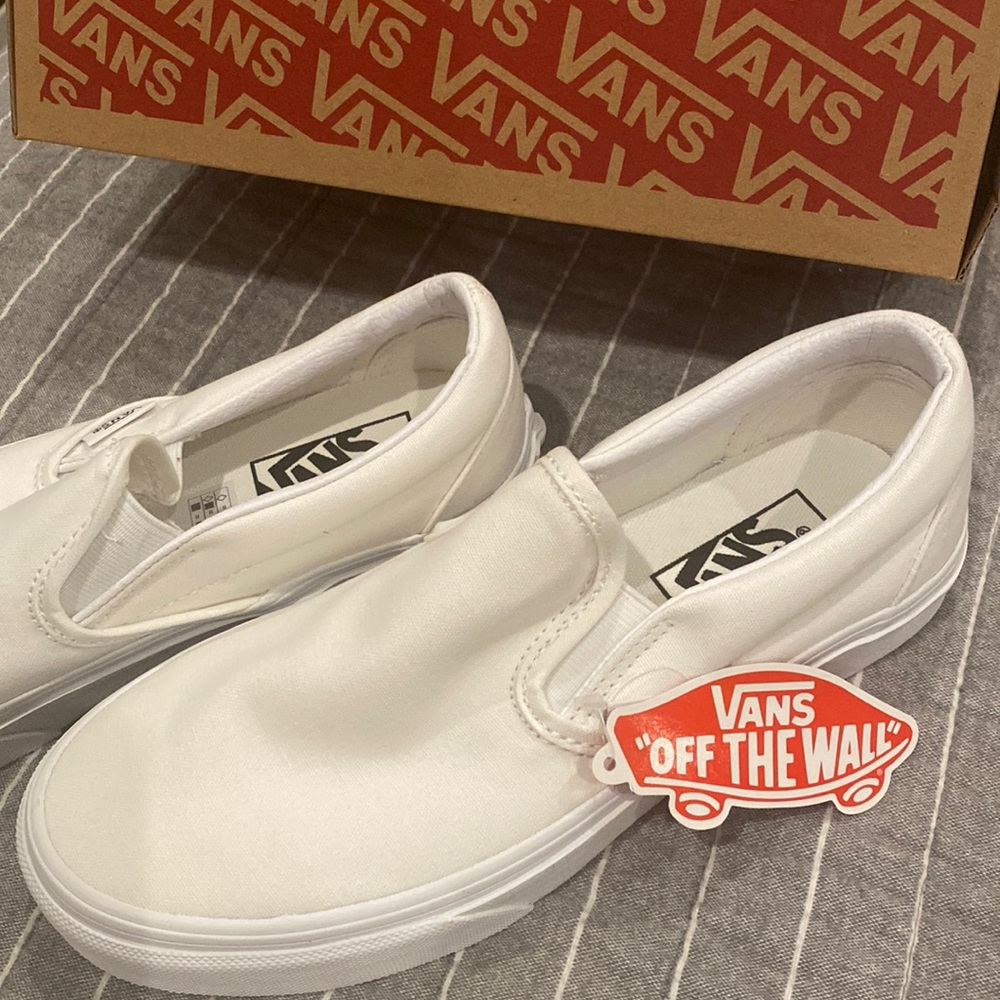 Vans white canvas slip on, never been worn Women’s size 6.5